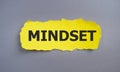 Mindset sign on yellow torn papper, Business concept,gray background Top view, Flat lay Royalty Free Stock Photo