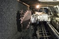 Mine excavator facing coal wall