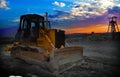Mine shaft sunrise with earth mover machine Royalty Free Stock Photo