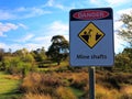 Mine shafts danger sign in Australian gold-mining countryside Royalty Free Stock Photo