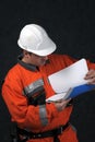 Mine worker with file Royalty Free Stock Photo