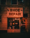 Mineola Shoe Repair shop at night, Mineola, New York