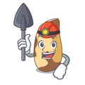 Miner brazil nut mascot cartoon