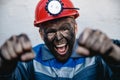 Miner man hands protest fist up revolution coal mine. Concept workers strike