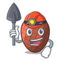 Miner mascot cartoon of moriche palm fruits