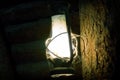 Miner`s Lamp in Dark Mine on a Wood Royalty Free Stock Photo