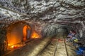 Miner in the underground mine with light in mine Stebnyk, Ukraine