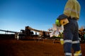 Miner worker wearing work uniform safety glove holding hard hat danger personal safety locks