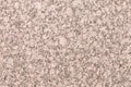 Mineral background with red or pink granite stone texture