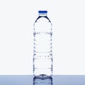 Mineral drinking water bottle on glossy table