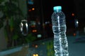 Mineral drinking water transparent plastic bottle reflecting close up Royalty Free Stock Photo