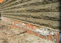 Mineral Efflorescence on the foundation house wall. Efflorescence mean as an indicator of moisture problems in house buildings.