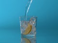 Mineral fizzy water pouring into a glass Royalty Free Stock Photo