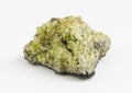 Olivine ore mineral raw on white background. Royalty Free Stock Photo