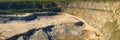 Mineral resources mining. Extraction granite quarry panorama Royalty Free Stock Photo