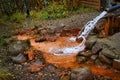 Mineral spring on the Narzan Glade in the Baksan Gorge Royalty Free Stock Photo