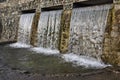 Mineral spring. Stream of floating water like SPA. Curative water in the Resort. Waterfalls in Summer