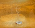 Mineral water bubbles into the tank in the spa Royalty Free Stock Photo