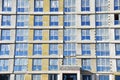 Mineral wool and plaster applied on new multi-storey building facade. Insulation for thermal protection to the shell of the house Royalty Free Stock Photo