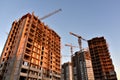 Mineral wool and plaster applied on new multi-storey building facade. Insulation for thermal protection to the shell of the house Royalty Free Stock Photo