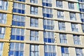 Mineral wool and plaster applied on new multi-storey building facade. Insulation for thermal protection to the shell of the house Royalty Free Stock Photo