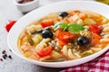 Minestrone, italian vegetable soup with pasta. Vegan food