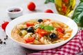 Minestrone, italian vegetable soup with pasta. Vegan food