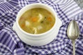 Minestrone, italian vegetable soup with served Turkish ravioli on gray backgrounds