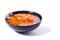 Minestrone soup in black bowl