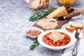 Minestrone soup with cavatappi pasta, beans and vegetables with crispy bread, horizontal, copy space Royalty Free Stock Photo