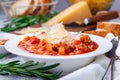 Minestrone soup with cavatappi pasta, beans and vegetables, served with crispy bread, horizontal Royalty Free Stock Photo