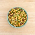 Minestrone soup mix in a bowl on a wood table Royalty Free Stock Photo