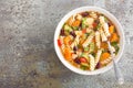 Minestrone soup. Vegetable soup with fresh tomato, celery, carrot, zucchini, onion, pepper, beans and pasta. Dish of italian cuisi Royalty Free Stock Photo