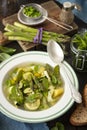 Minetsrone soup with potatoes, zucchini and asparagus