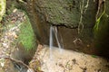 Mini artesanal font with water silk effect in trekking path Royalty Free Stock Photo