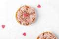 Mini Banoffee pie topped with sugar heart on the white table