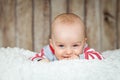 Cute 6 months baby boy in a monkey costume Royalty Free Stock Photo