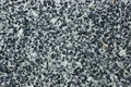 Mini black stone in concrete wall Royalty Free Stock Photo