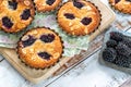 Mini blackberry bakewell tarts