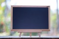 Mini Blank blackboard on wooden table  with Copy space . chalkboard Royalty Free Stock Photo