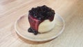 Mini Blueberry New York Cheesecake on Wooden Plate