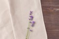 Mini bouquet of fragrant lavender on a beige fabric background. top view, copy space Royalty Free Stock Photo