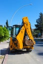 Mini bulldozer or excavation or loader on road. Royalty Free Stock Photo