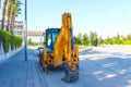 Mini bulldozer or excavation or loader on road. Royalty Free Stock Photo