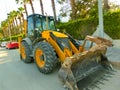 Mini bulldozer or excavation or loader on road. Royalty Free Stock Photo