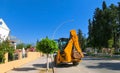 Mini bulldozer or excavation or loader on road. Royalty Free Stock Photo