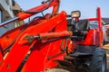 Mini bulldozer parked at the ouse for ground work Royalty Free Stock Photo