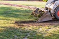 Mini Bulldozer Removing Grass From Yard Preparing For Pool