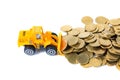 Mini bulldozer truck loading stack coin with pile of gold coin, Royalty Free Stock Photo