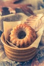 Mini bundt cake, guglhupf, muffin in a rustic bowl with autumn leaves Royalty Free Stock Photo